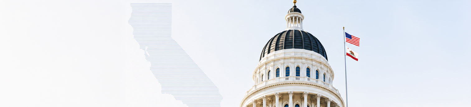 The top  of the CA Capitol Building with a image if the state of California on it's left.