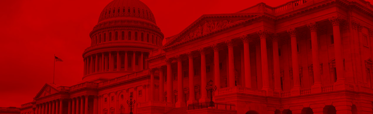 US Congress Building with strong red overlay.