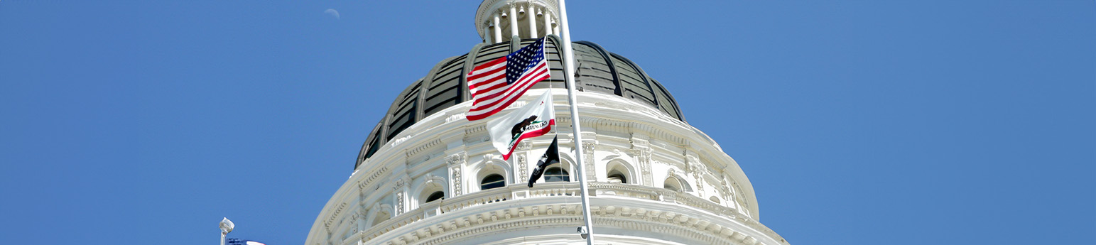 Photo of the top of the top of the CA capitol building.