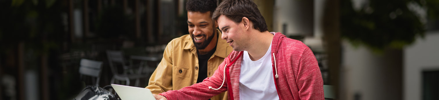 A payee helping out a person with a disability with his finances.