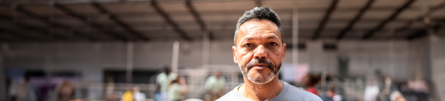 Portrait of a mature man at a community center.