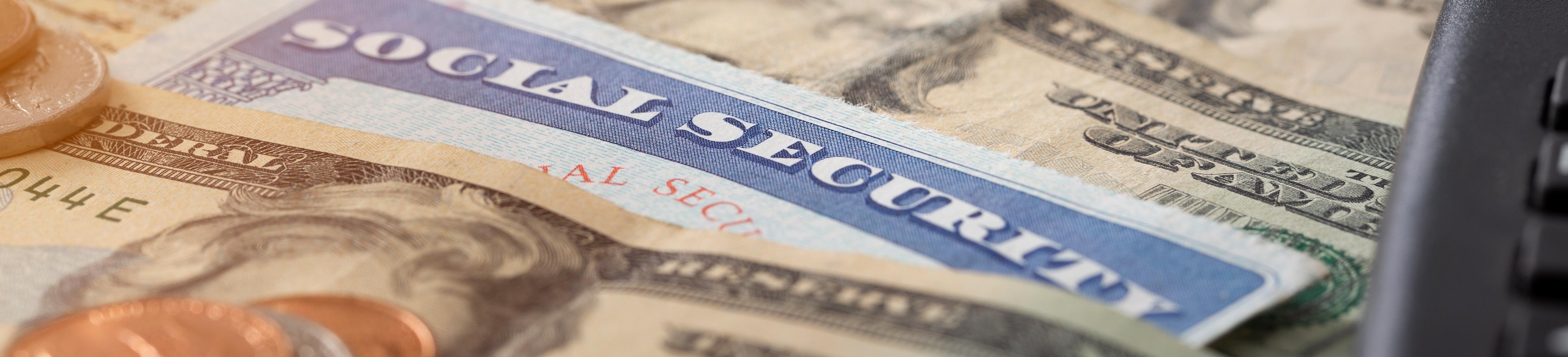 Image of money along with a Social Security Card.