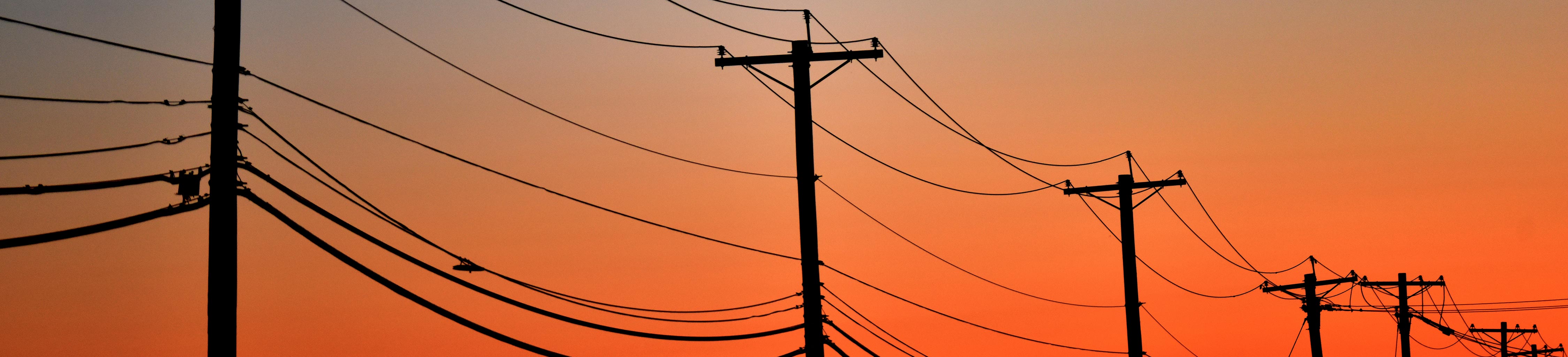 Image of powerlines at sunset.