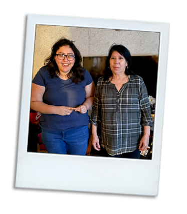 A polaroid photo of a woman with a disability with her mom next to her. Her mom is her caretaker.