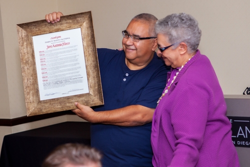 Photo of a client receiving an award.