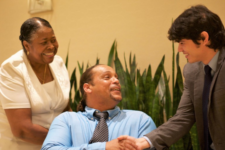 Mr. Johnson with mother and DRC staff