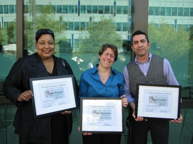 Photo of Leslie Napper receiving an award.