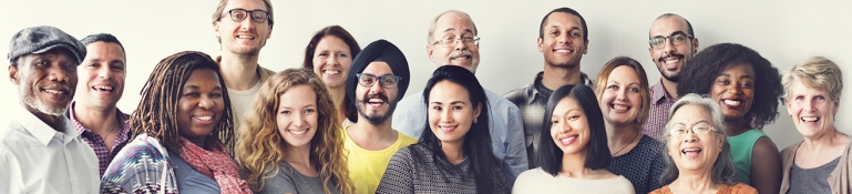 Group of diverse people smiling for the camera.