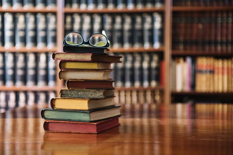 Stack of books in library