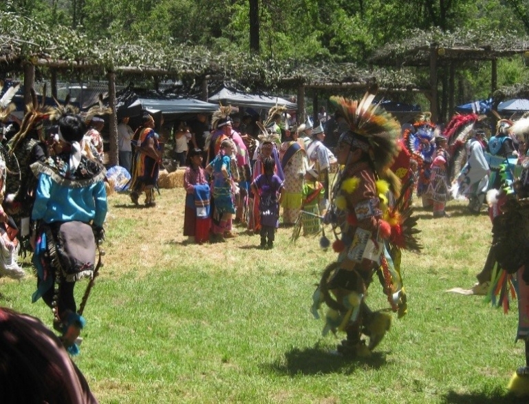 Photo of Big Sandy Pow wow Tribal Dancers in Regalia.