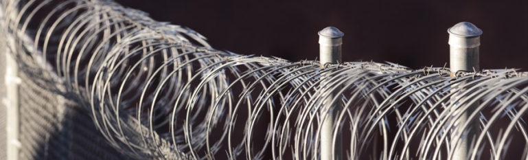 Photo of a prison razor fence