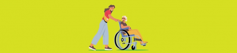 Woman helping her mother, in wheelchair, get to the hospital