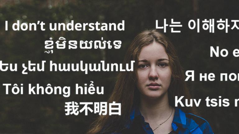 Photo of a girl with a confused look on her face because she doesn't understand different languages. The text "I Don't Understand" is overlayed on the photo in 9 different languages