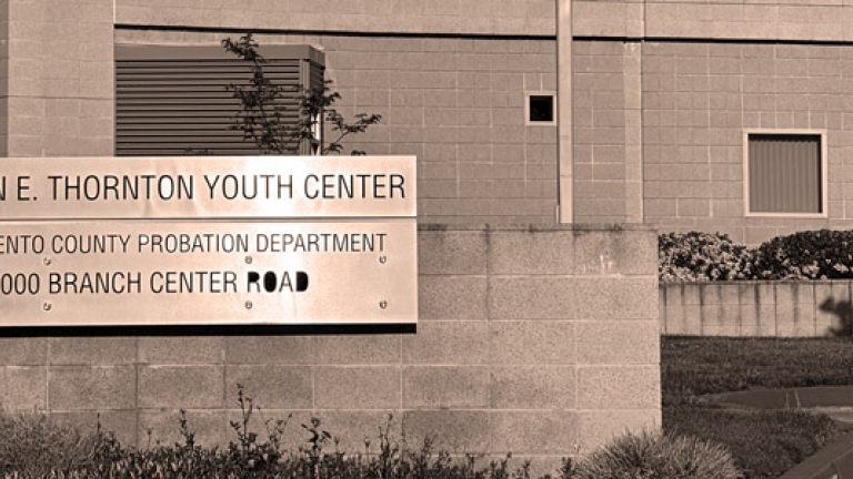 Metal sign for the front of the Warren E. Thornton Youth Center.